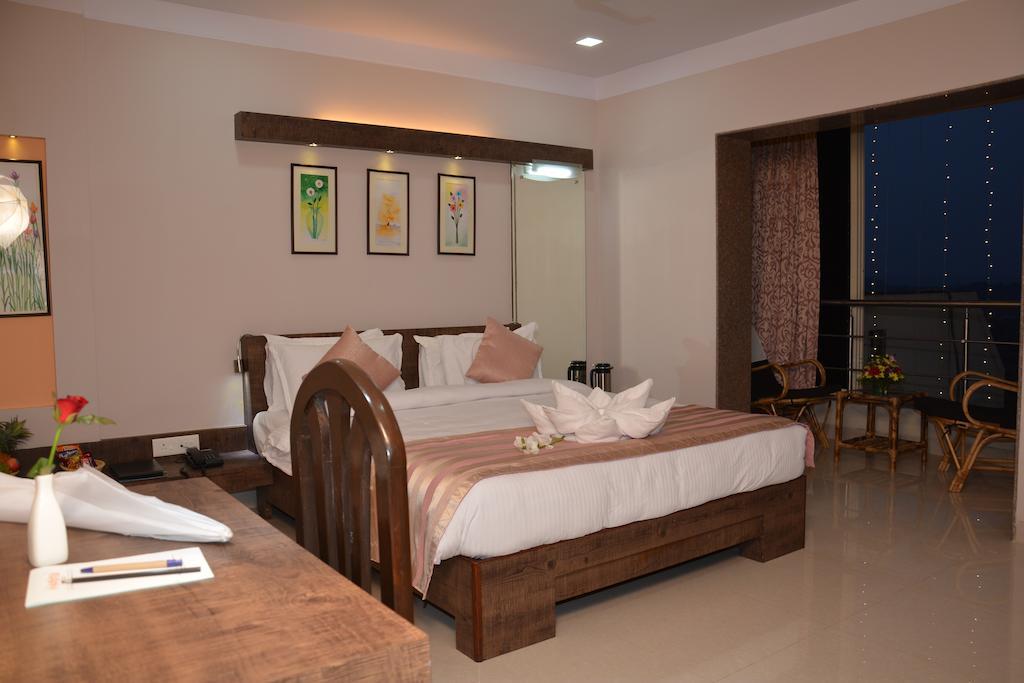 Boshan Hotels Mapusa Værelse billede